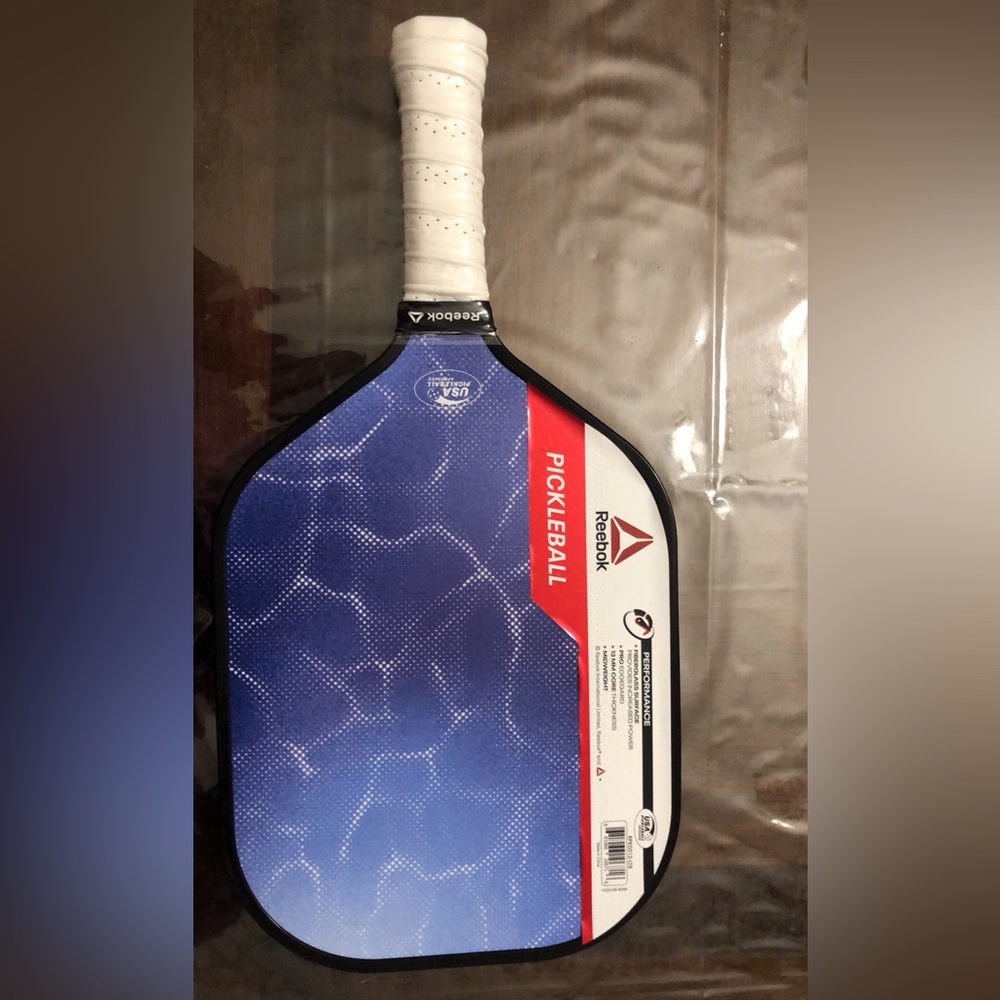 Reebok Lifestyle Lightweight Fiberglass Pickleball Paddle Blue and Pink.